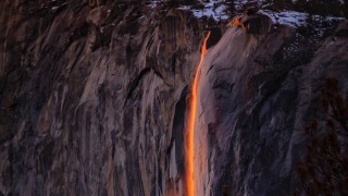 Nicely lit waterfall in the sunset that seems like lava